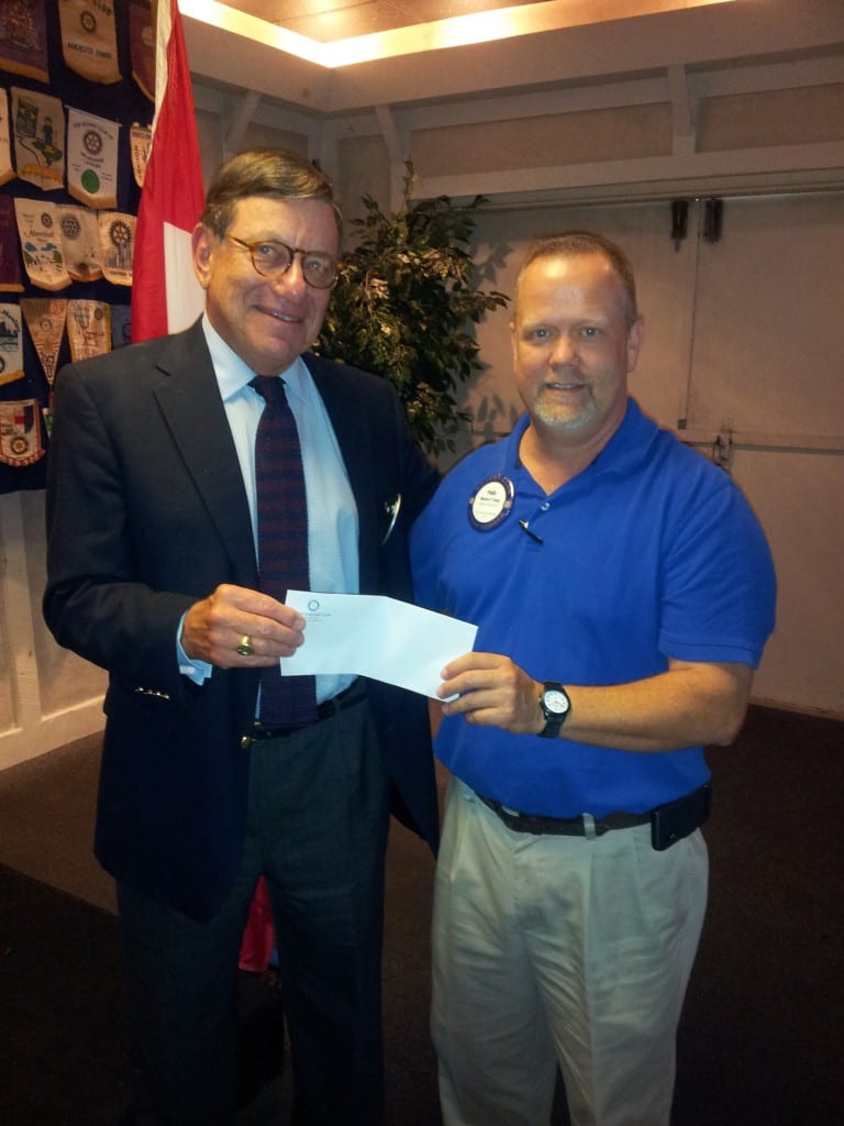 EastPoint Prosthetics and Orthotics receives a 500 donation check from Kinston Rotary Club for